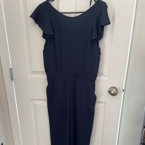 Wide leg jumpsuit with flutter sleeves.